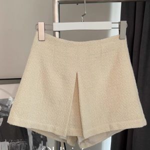 Beige shorts woman